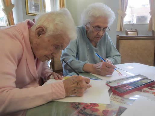 Eon-Arts, artist Ian Potts, Painters at an Eon-Arts Paint a Poppy art workshop.